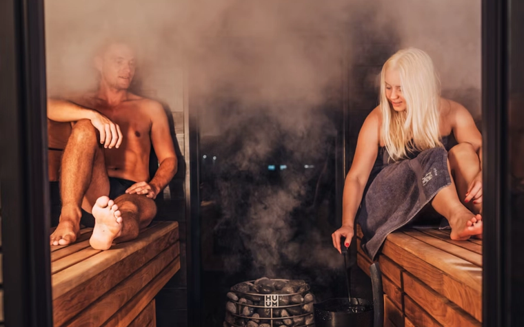 Two people in a sauna