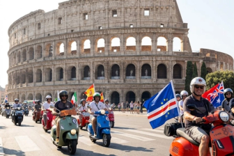 Vespa riders drive past the Colosseum