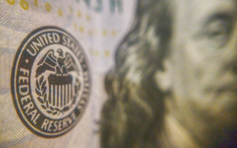 Federal Reserve logo on a bank note