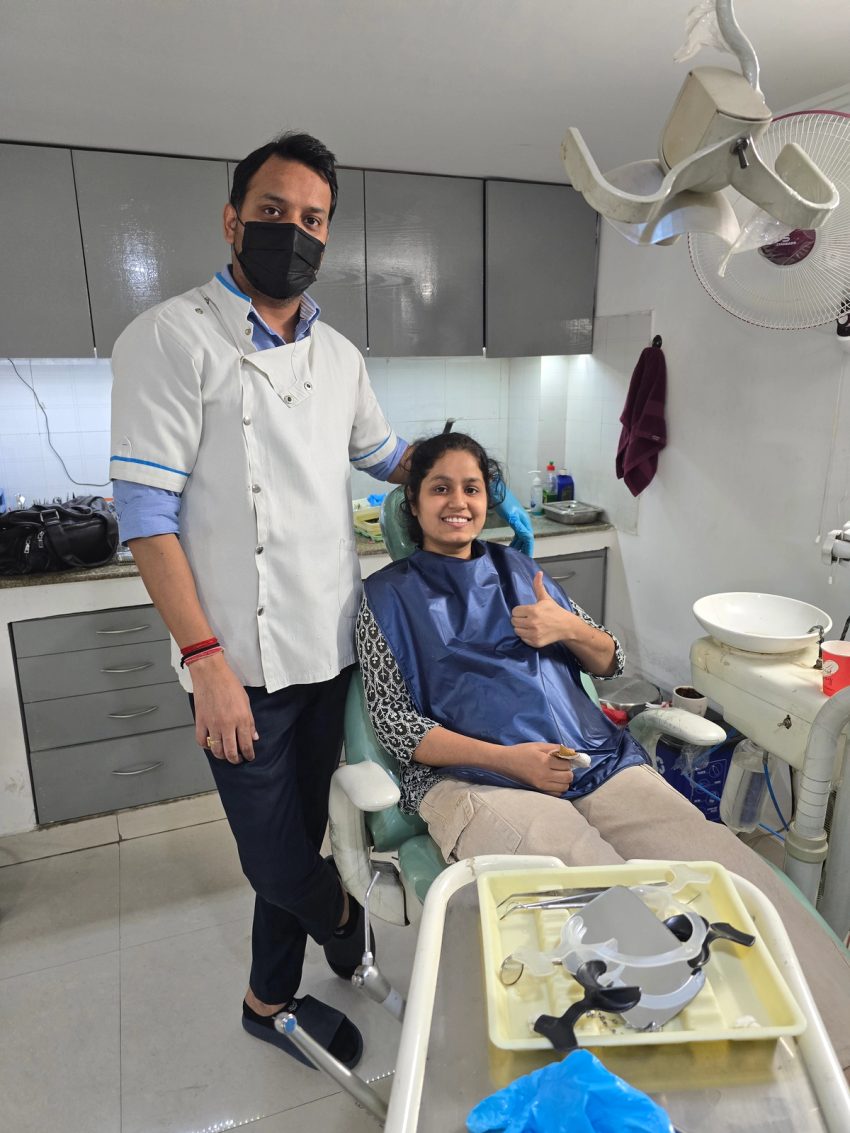 A patient and dentist together at Gupta Dental