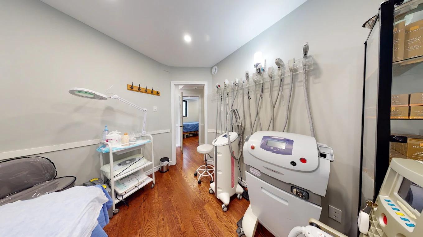 Treatment handpieces racked along the wall of a clinic room.