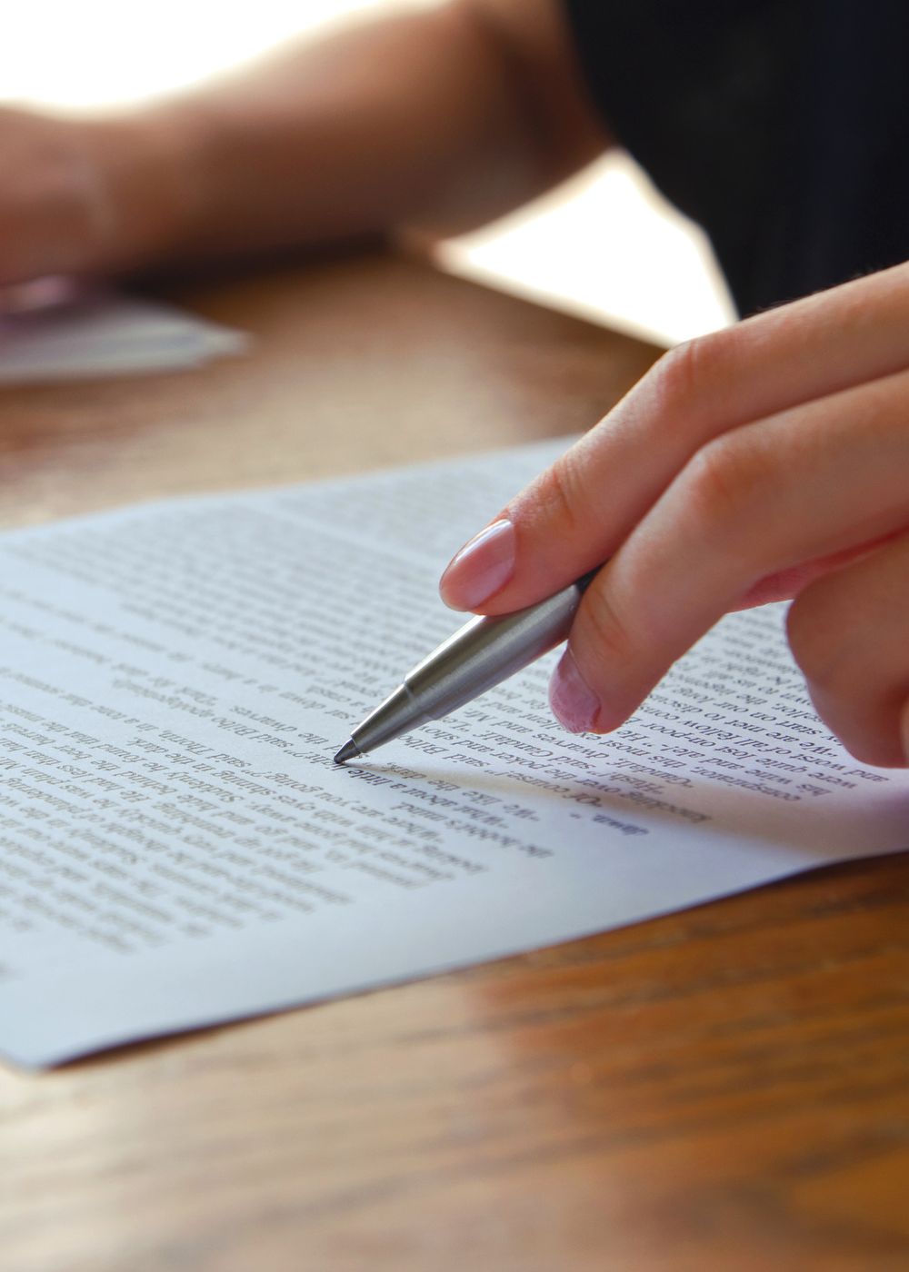 Person reviewing a printed document