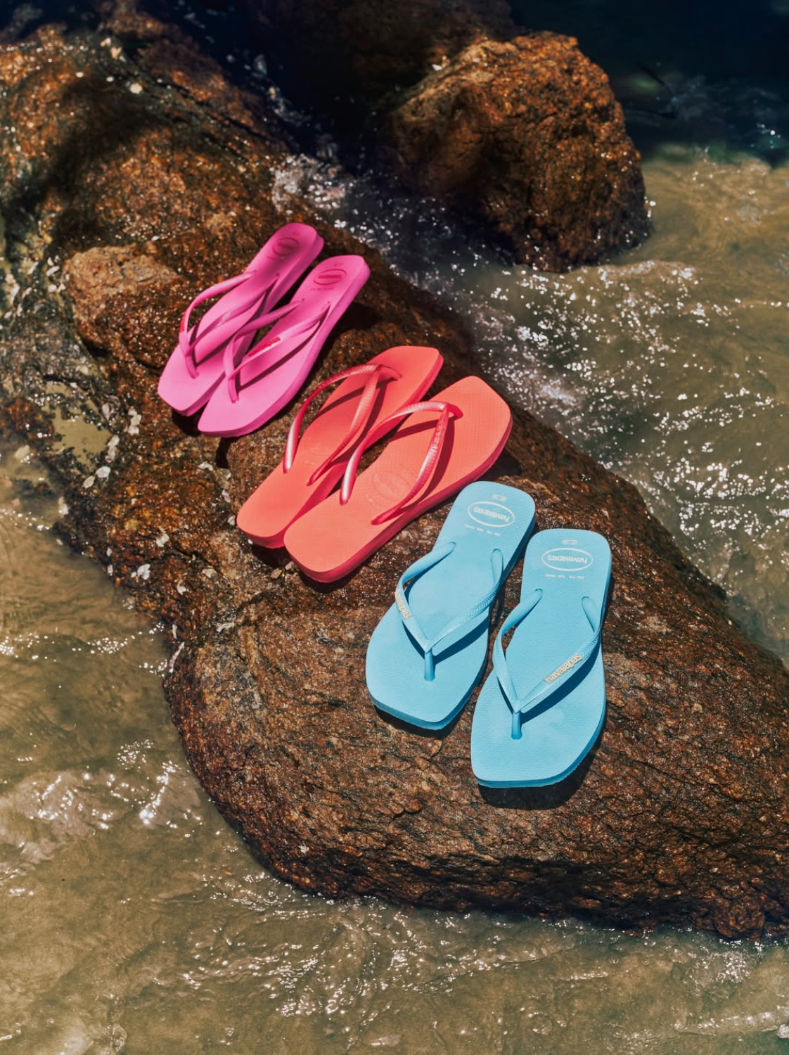 Havaianas product photography on a beach rock