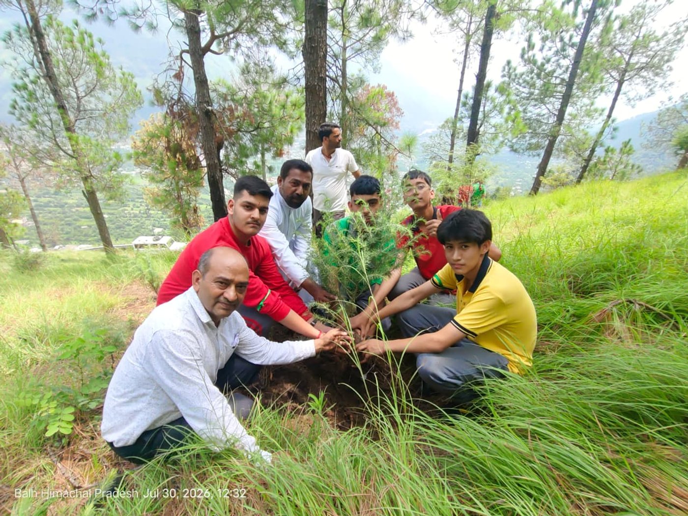 Eco-volunteers planting the sapling of Deodar Cedar meaning “Wood of the GOD”