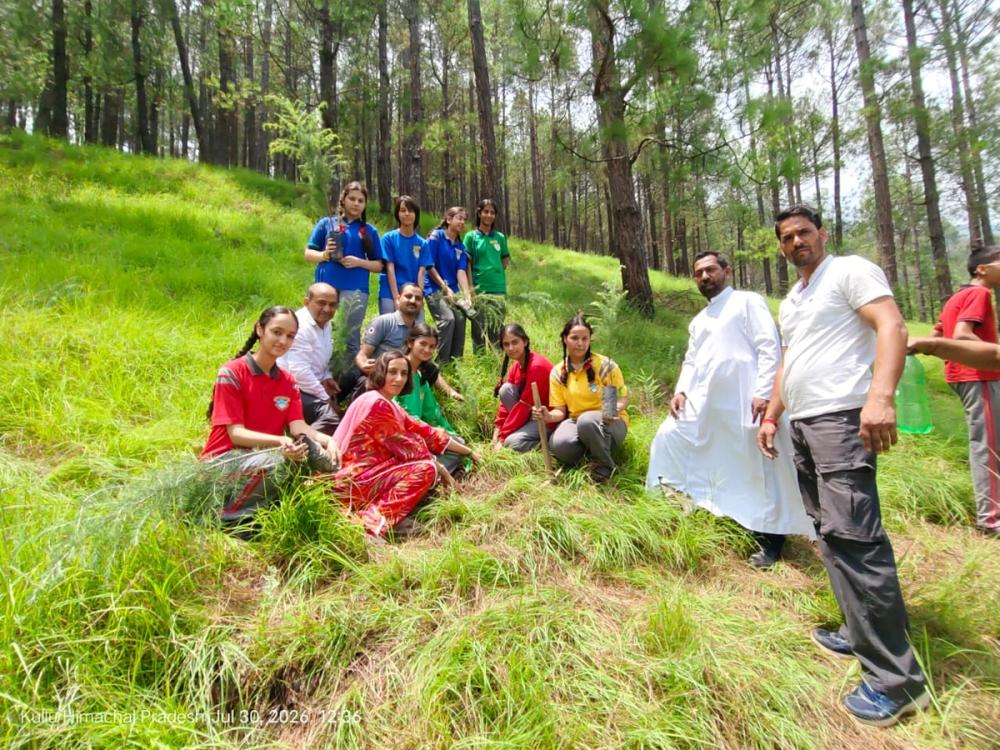 Eco-volunteers planting the sapling of Deodar Cedar meaning “Wood of the GOD”
