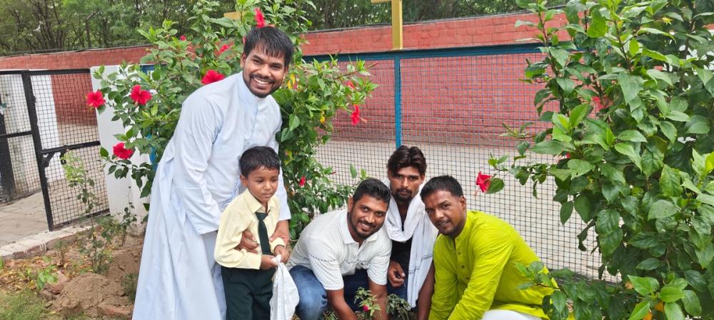parishioners enthusiastically participated in a tree-planting drive on the church premises, planting the saplings they had brought from their homes.