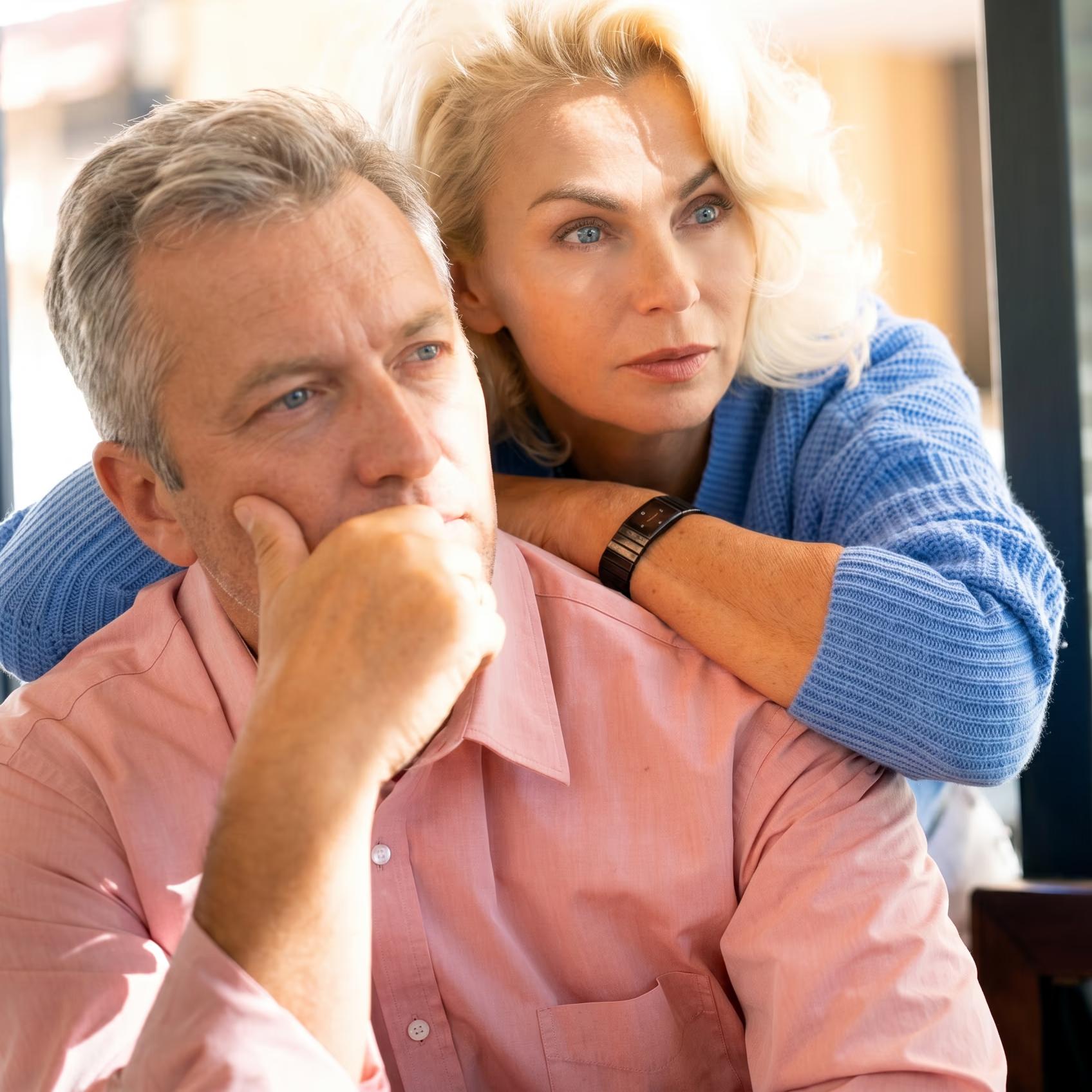 retiring couple thinking deeply