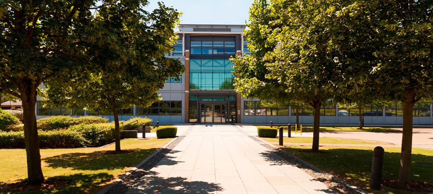 exterior photo of St Johns Innovation Centre, a smart building with large glass windows