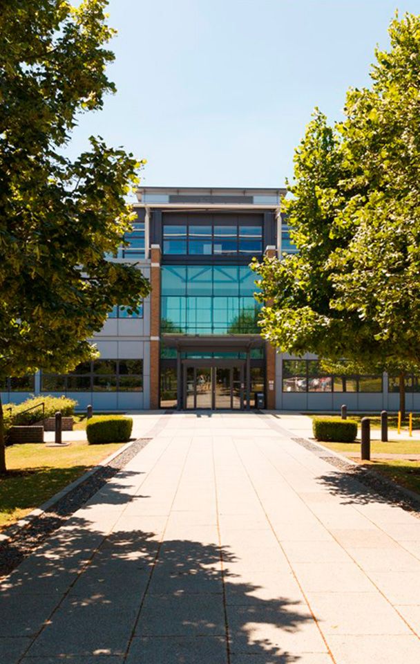 exterior photo of St Johns Innovation Centre, a smart building with large glass windows