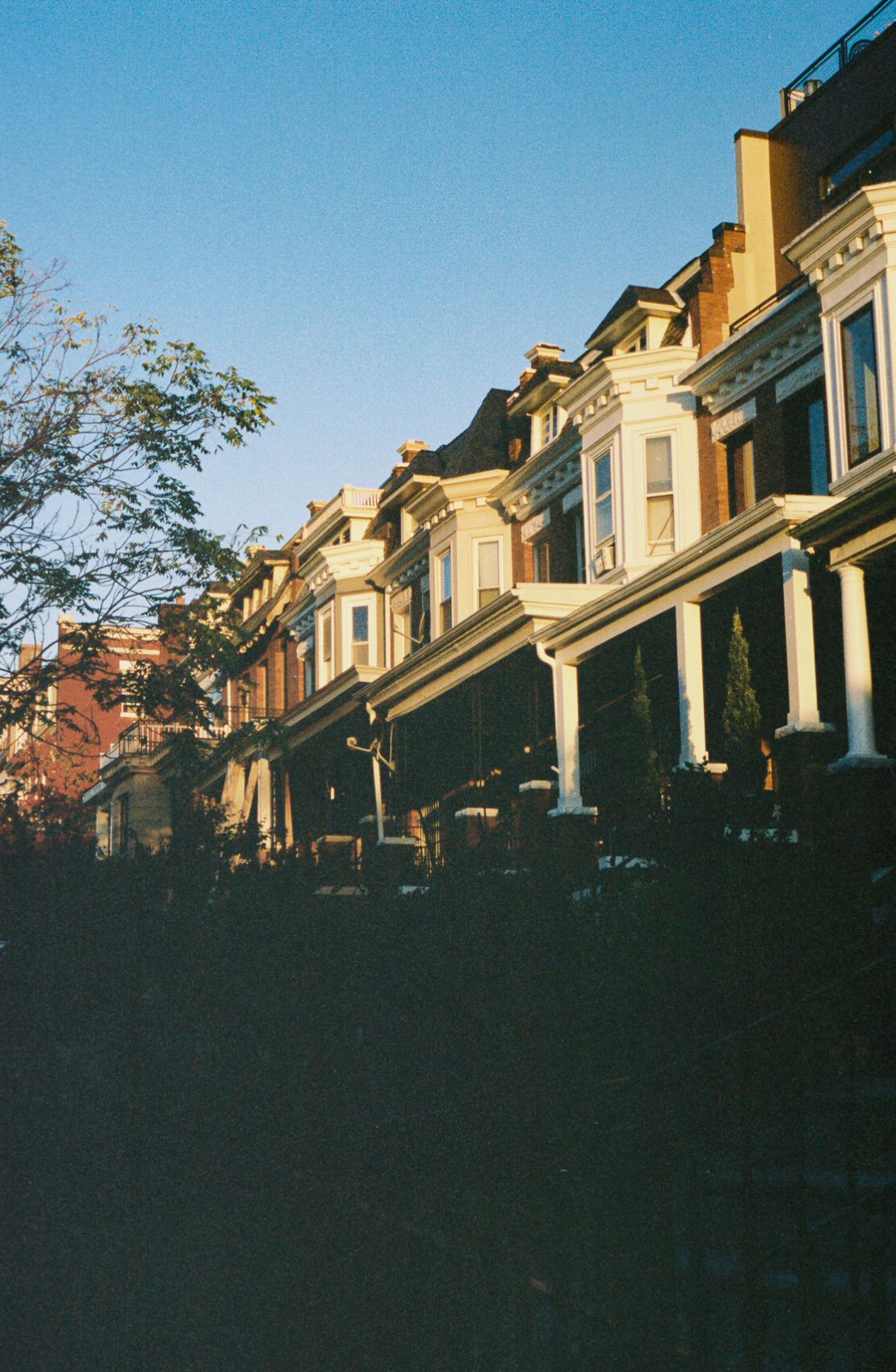 A row of historic homes at dawn, photographed in Eckington, near Howard University in Washington, DC