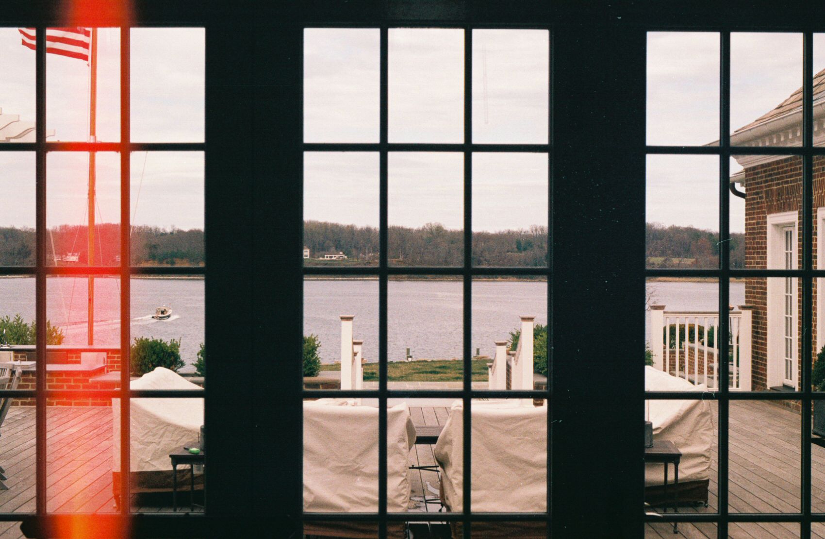 35mm film photograph of Severn River, seen through the window of a riverside home in Annapolis, Maryland