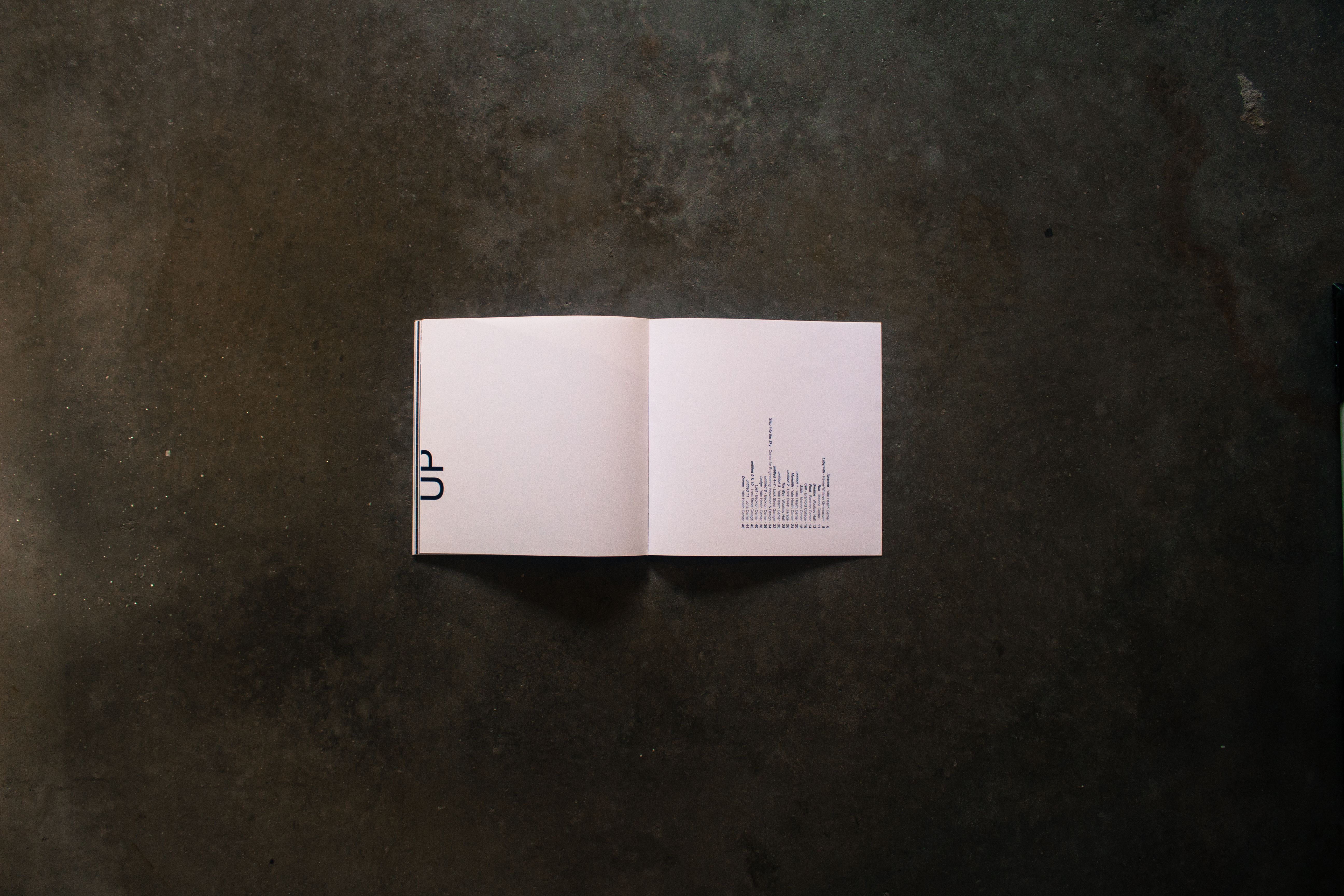The final spread of Up: featuring minimalist typography and a list of photographs.