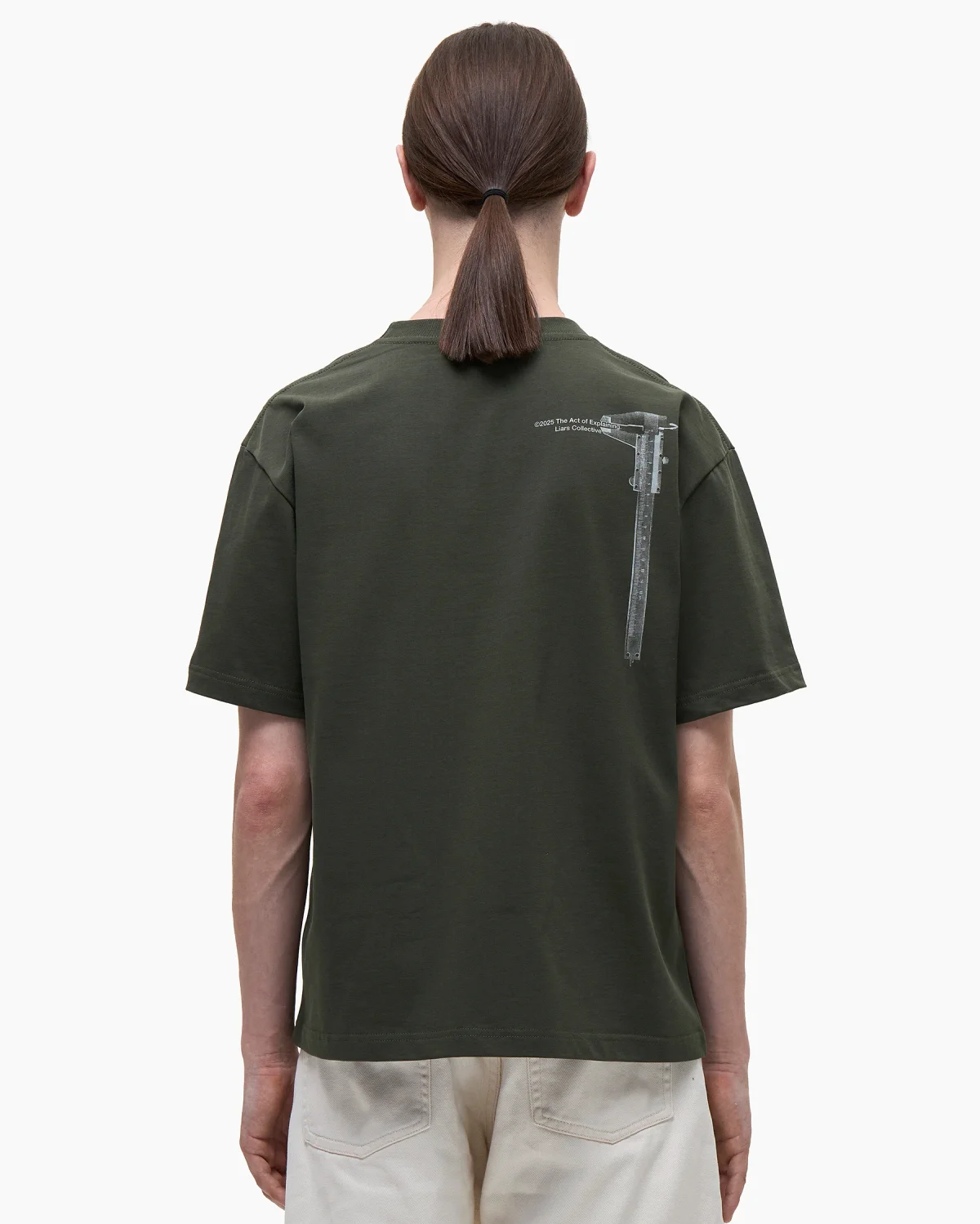 Tee 'The Act of Explaining' Green