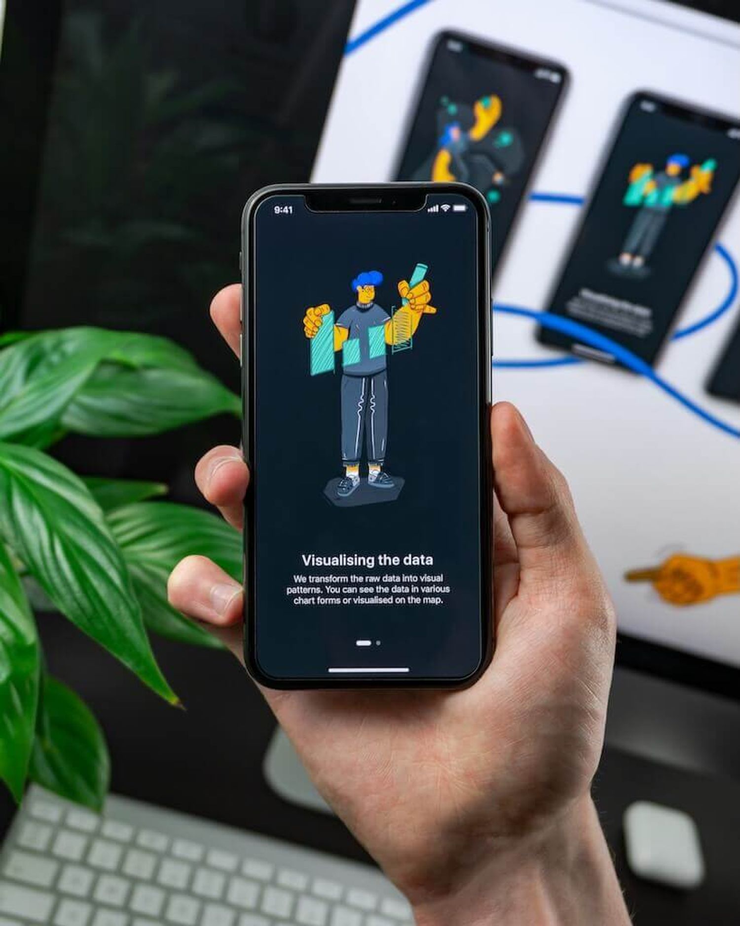 A phone and laptop displaying a B2B branding logo clearly on their screens