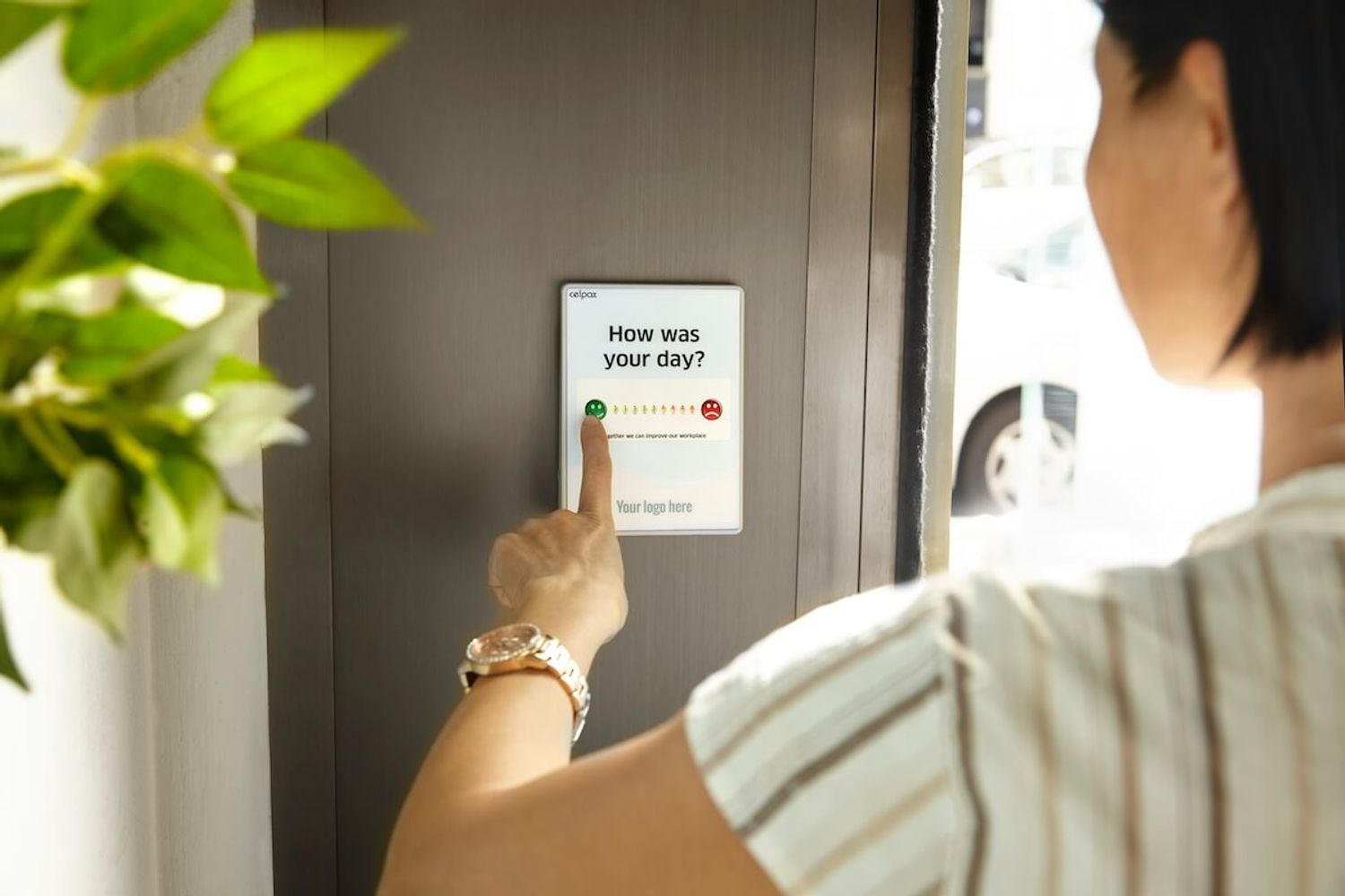 Person completing a feedback form to help improve team performance and growth showcases the startup feedback culture