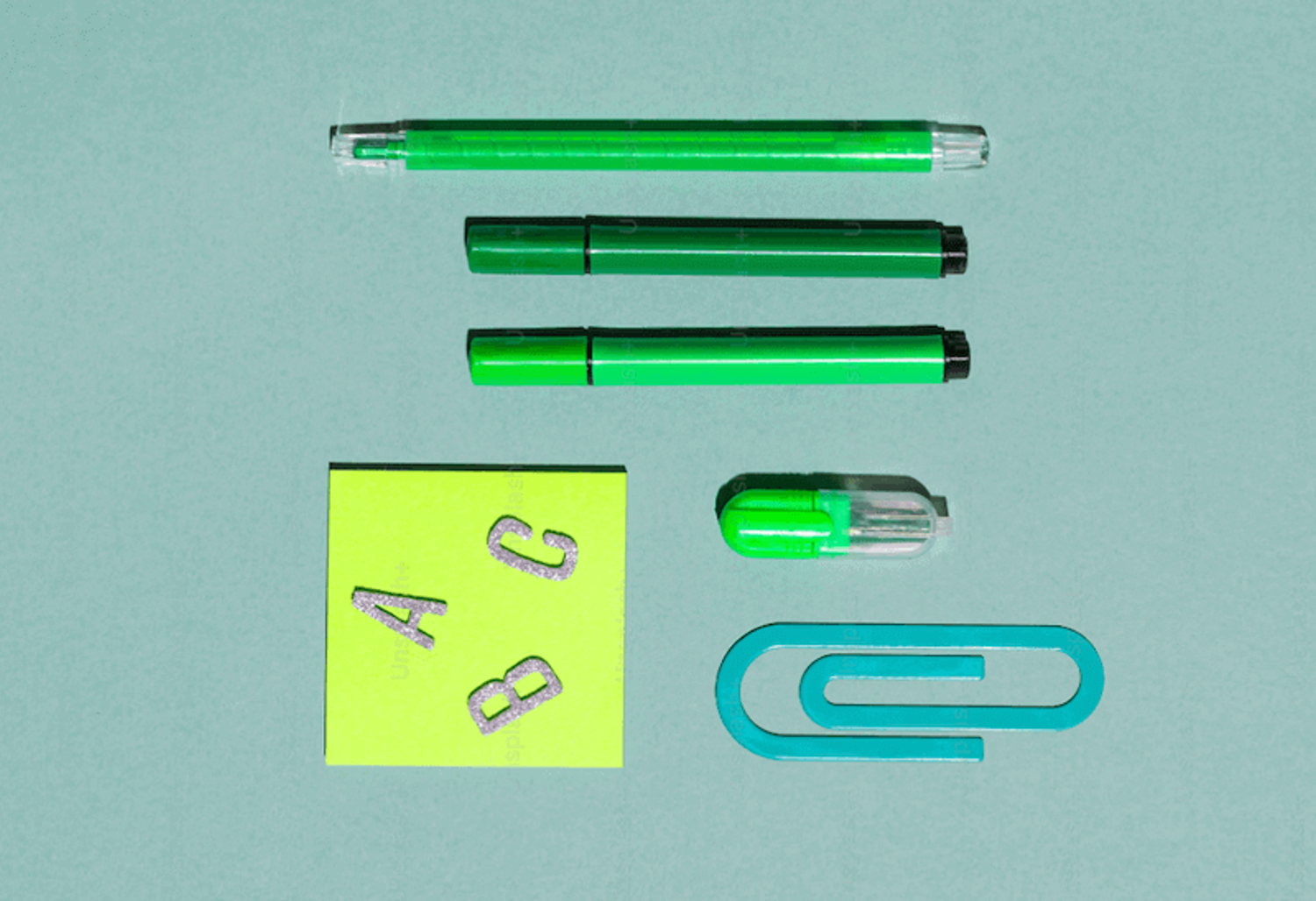 Clippers and letters symbolizing tools for building a strong employer branding framework.