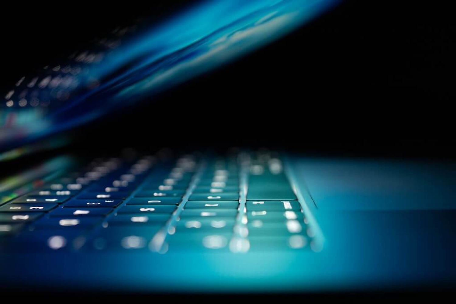 Open laptop symbolizing digital data room usage for efficient due diligence process