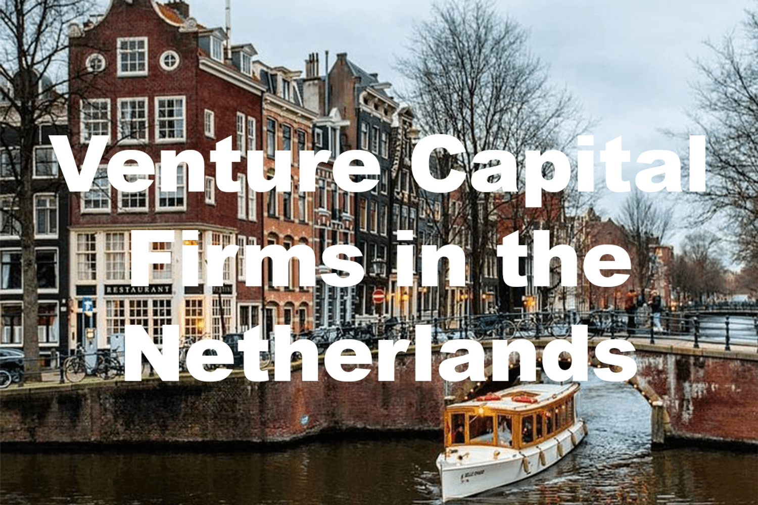 A scenic view of Amsterdam with historic canals, charming buildings, and bustling city life, mirroring the rich vc landscape the Netherlands