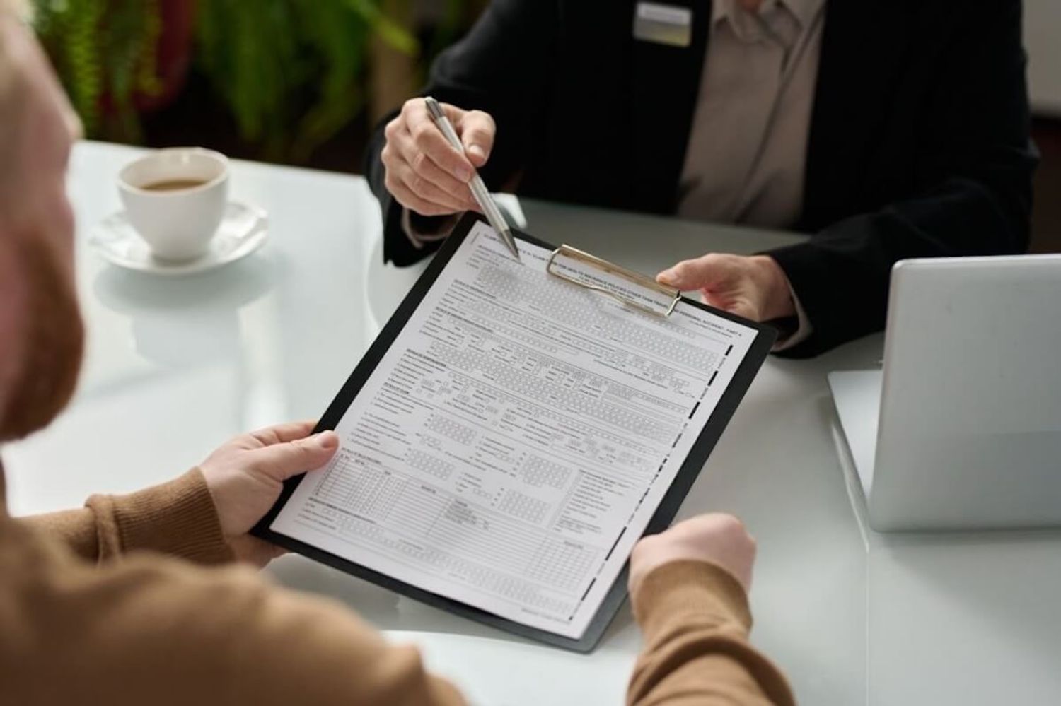 Stack of registration papers, representing the process of starting and registering a company business or startup