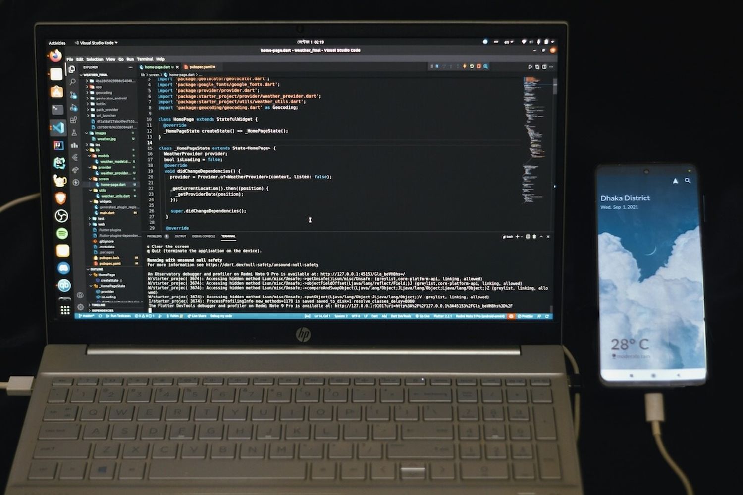 Person typing code on a laptop, symbolizing AI-powered no-code MVP development tools like Lovable AI