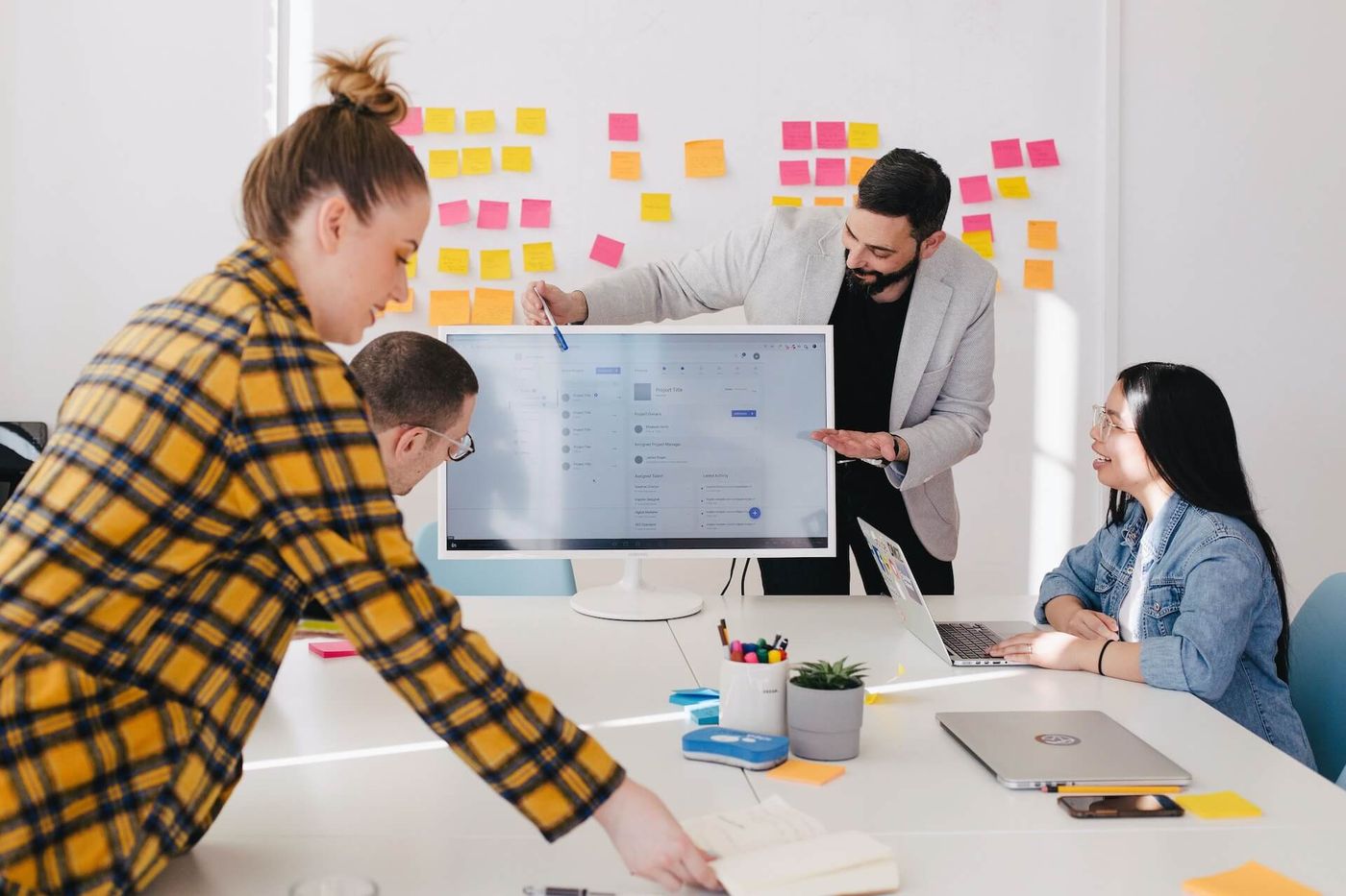 Man designing a pitch deck for investors