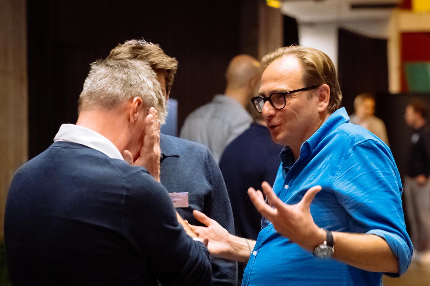 Founder of Pitchdrive, Boris Bogaert, talking to startups at an event