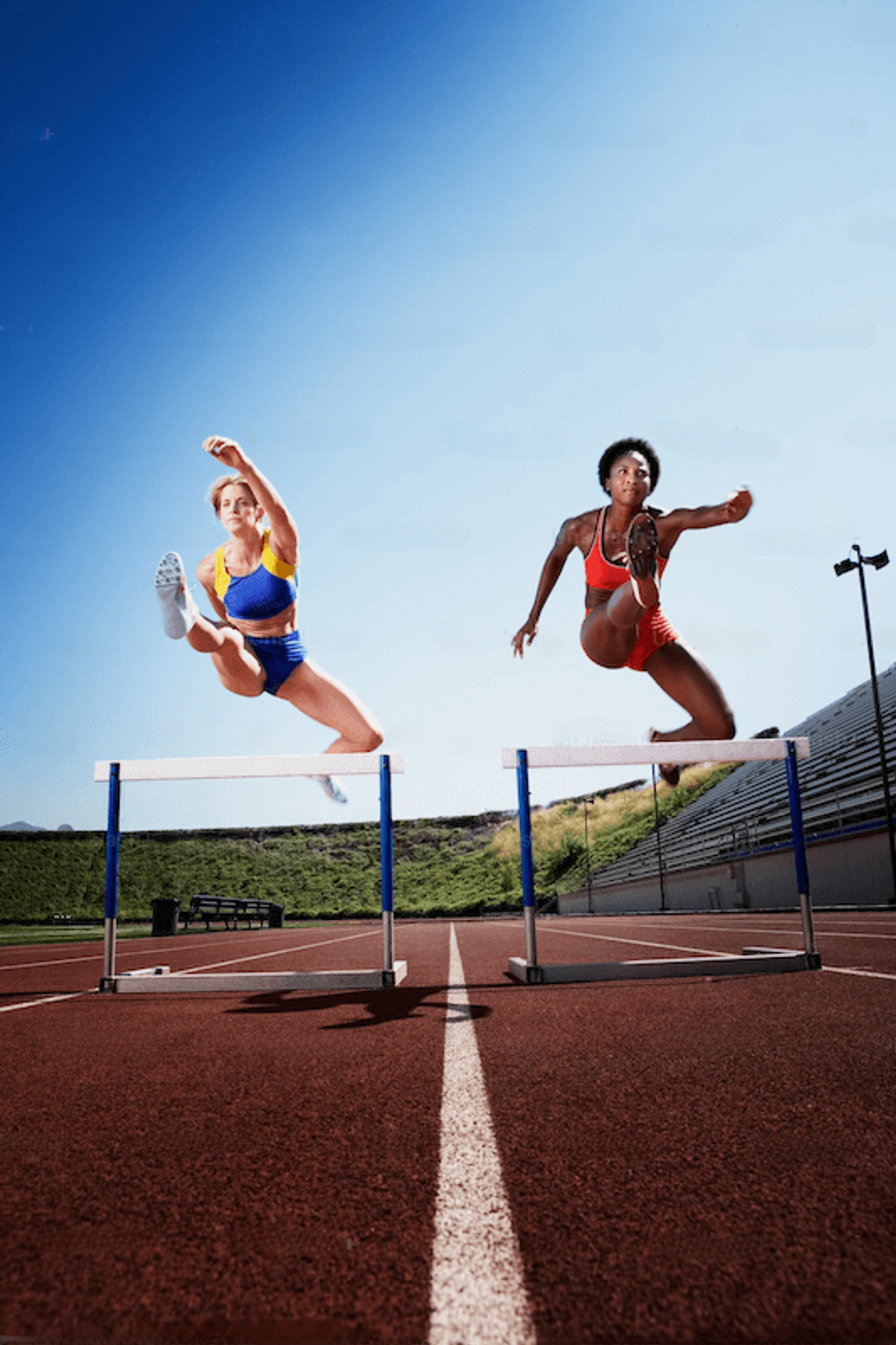 Two athletes sprinting side by side, symbolizing fierce competition and the race to outperform competitors with a competitor analysis template