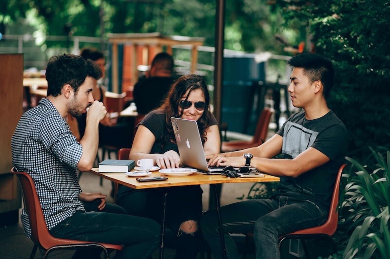 three humans wondering how to get pre seed funding for startups