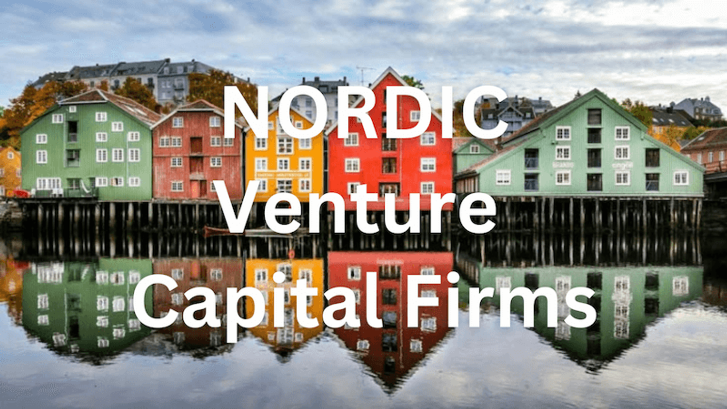 An atmospheric view of a historic Nordic city with colorful old buildings, narrow streets, and a waterfront with the text; Nordic Venture Capital FIrms