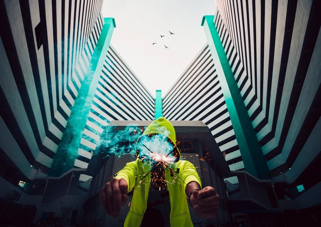 man holding sparklers