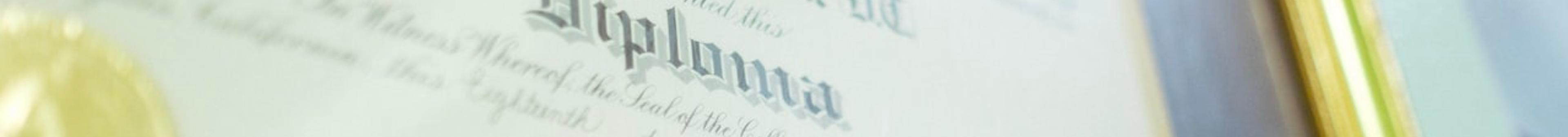 Close-up of a framed academic diploma certificate with gold seal, representing educational qualifications and equivalence