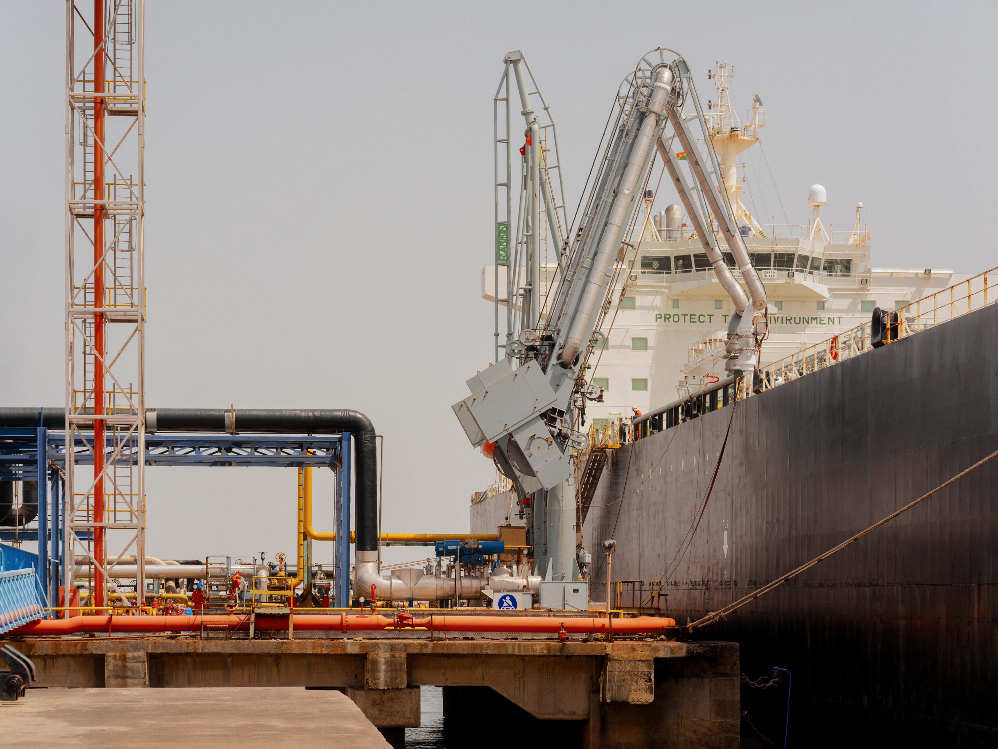 Cargo being unloaded off a ship at the marine jetty