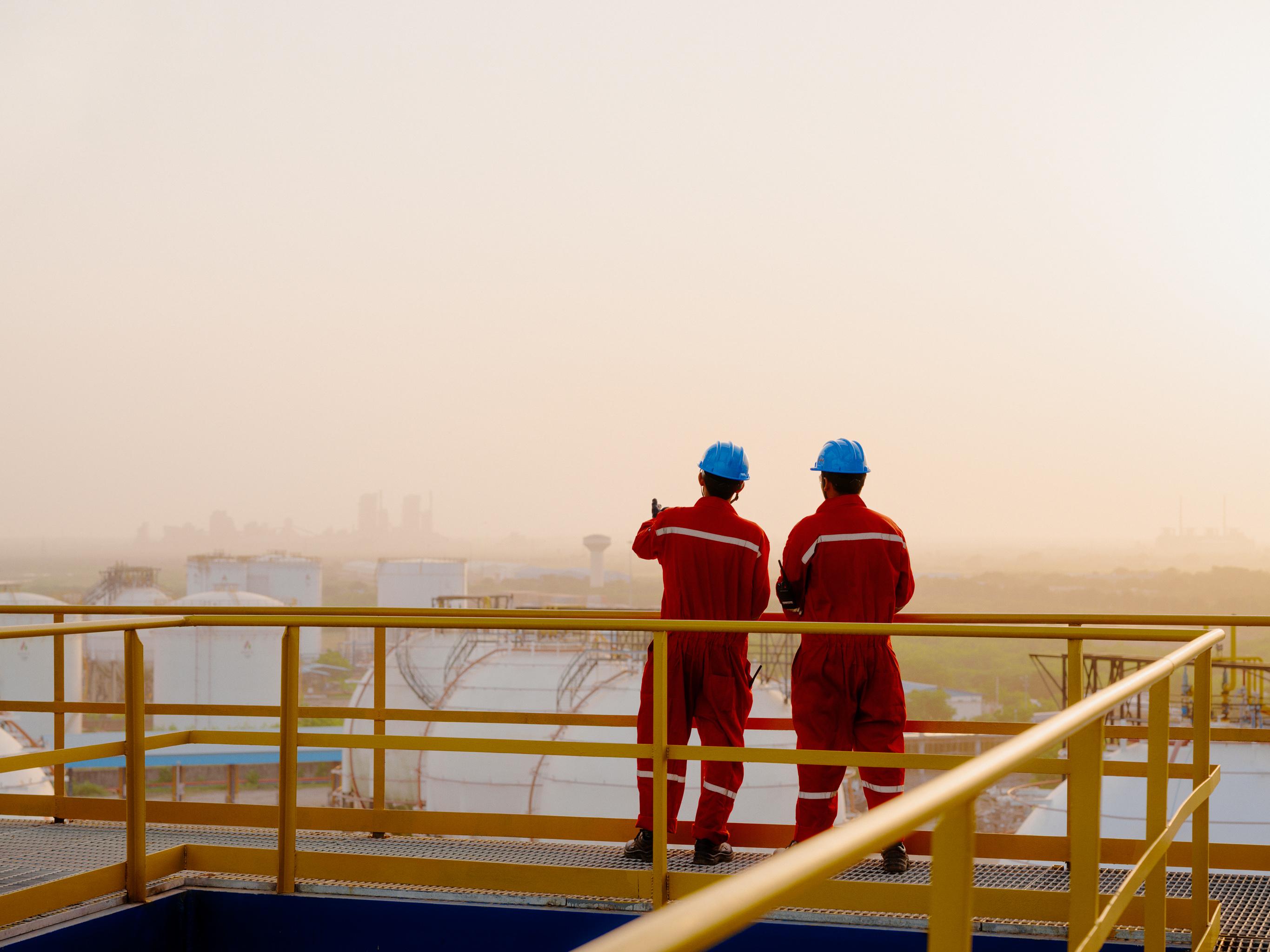Two AVTL workers look over the Kandla terminal.