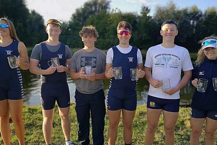 Some of Sudbury’s juniors posing with pots at a summer regatta.