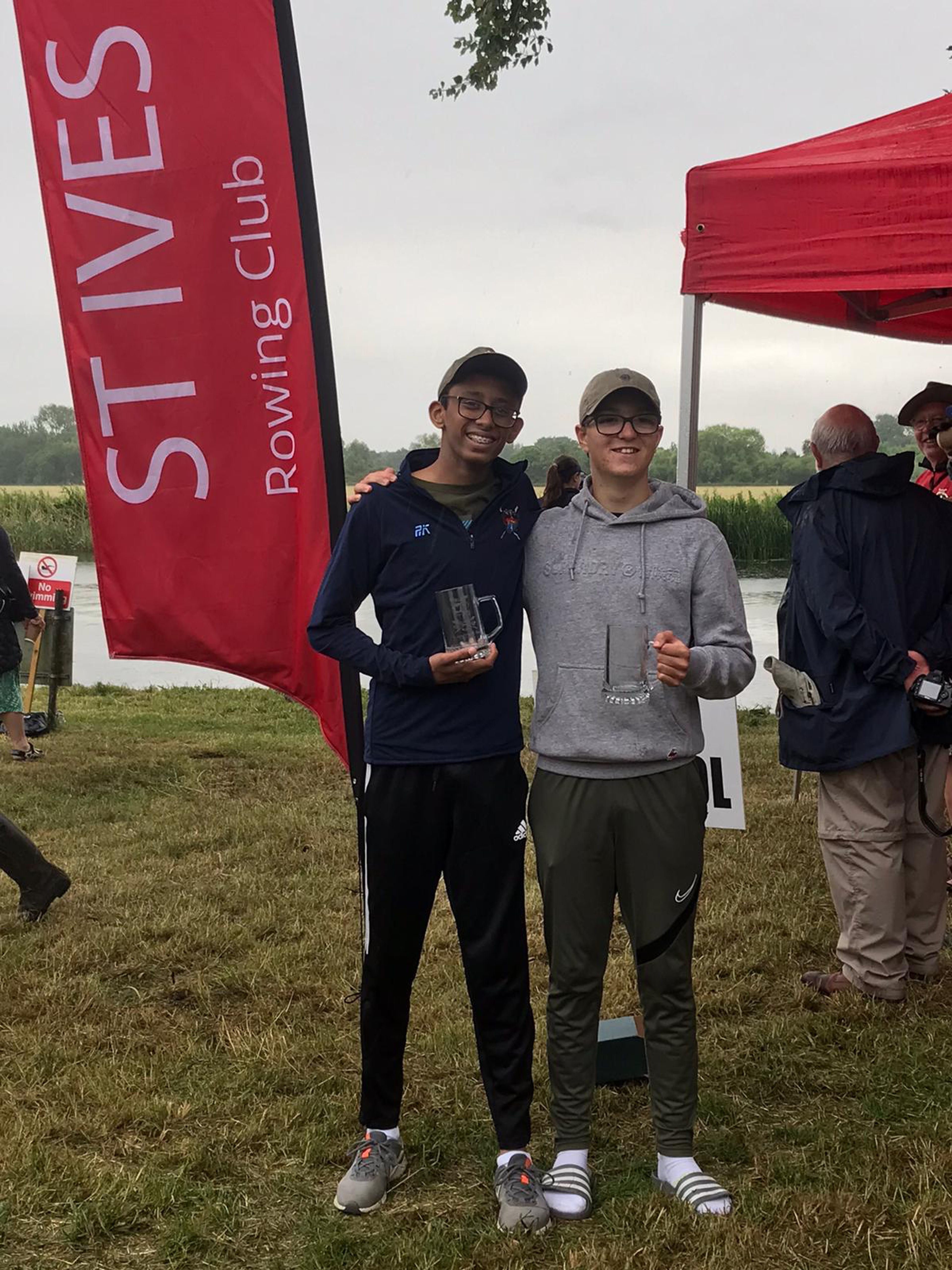 The winning J16 scullers pose with their pots.