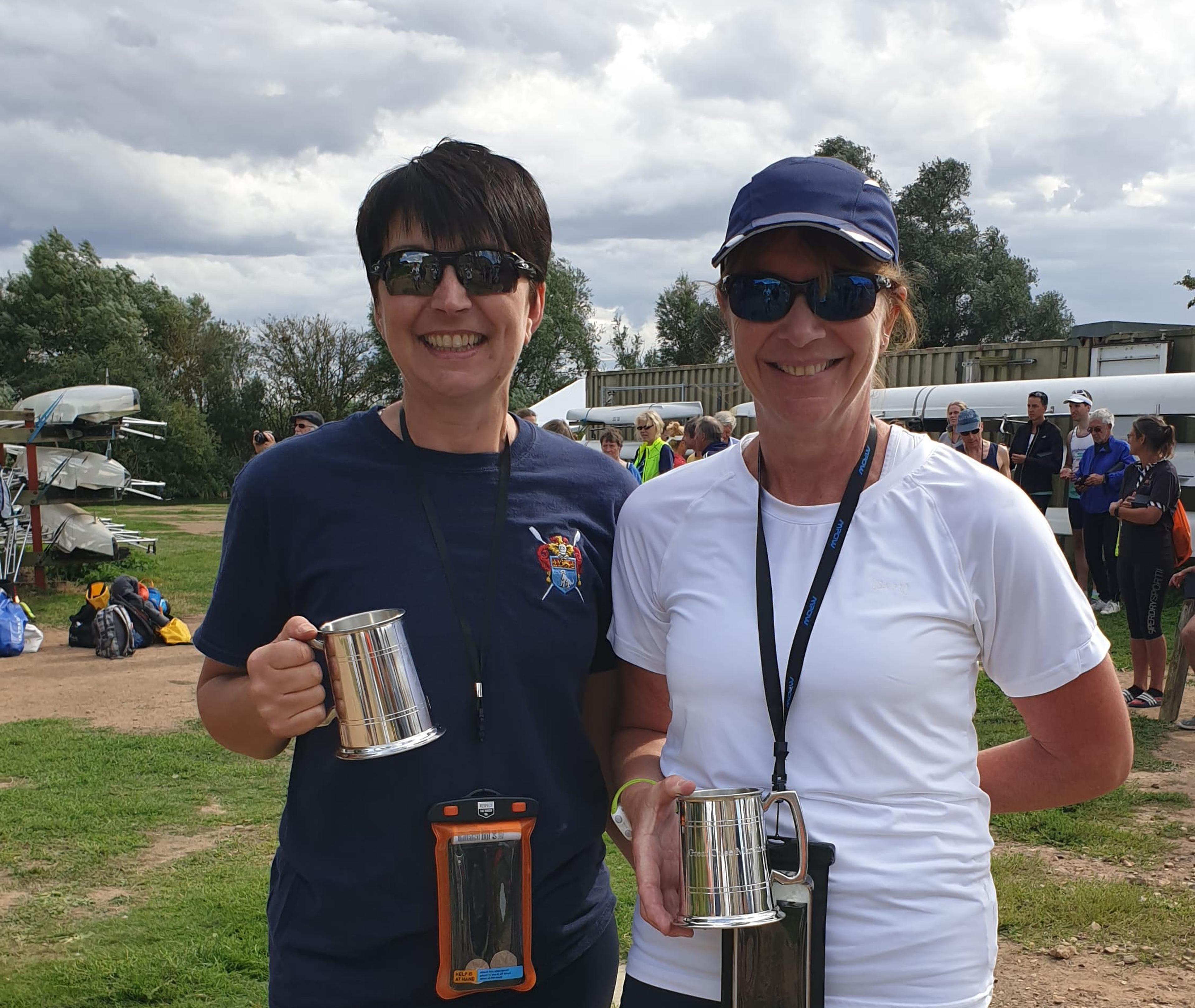 Winners Teresa Moriarty and Tracy Muir, holding their pots in Ely. 