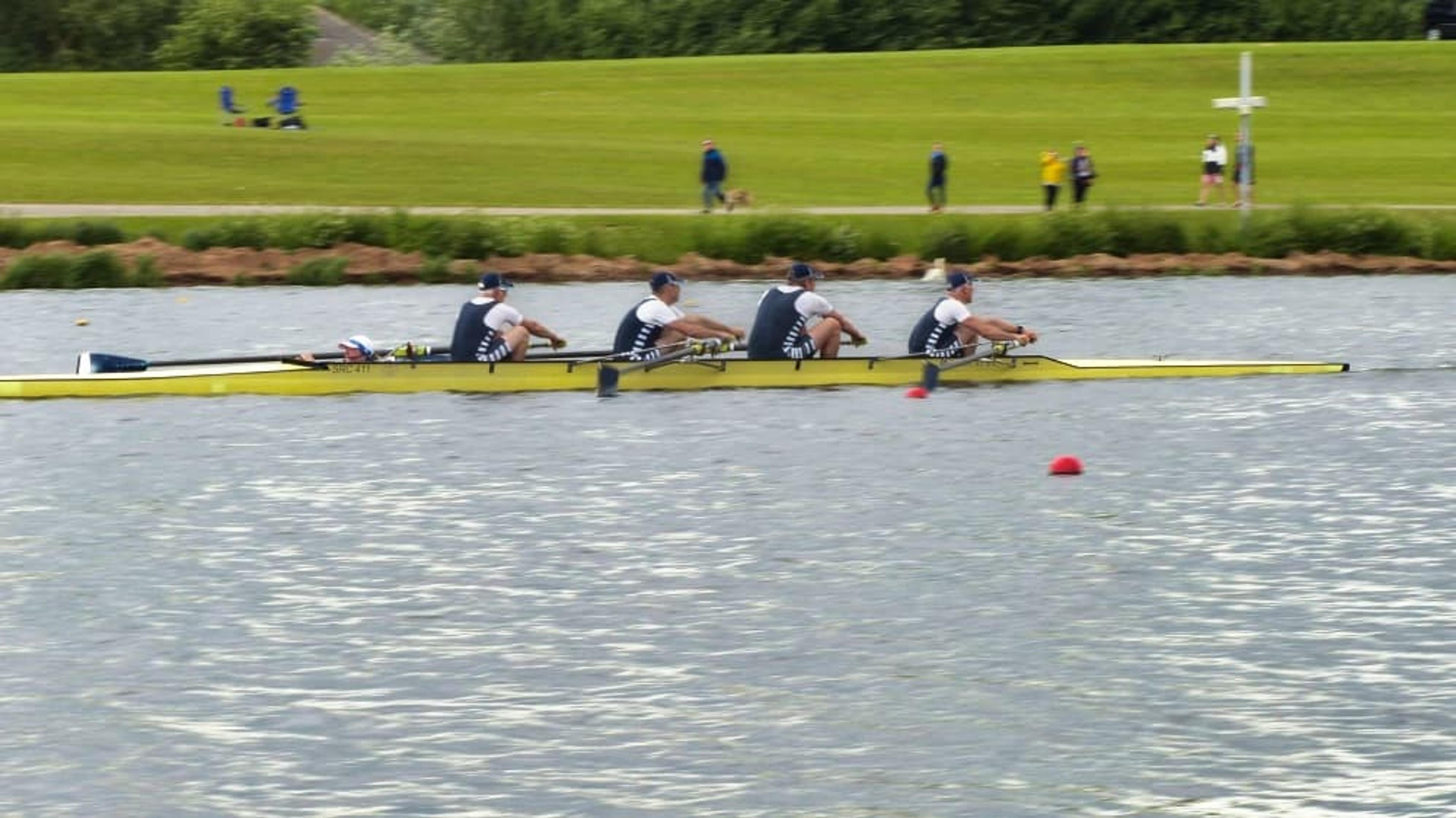 The mens’ crew zipping past.