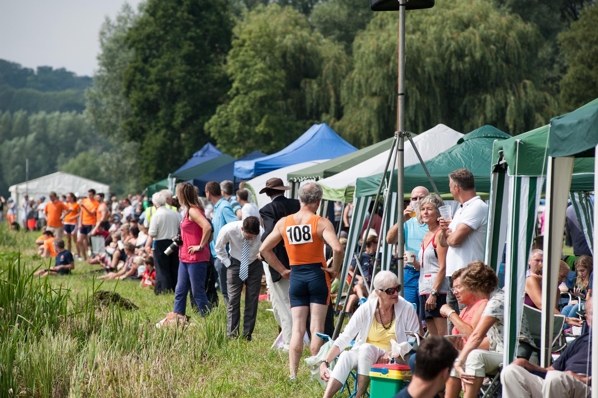 Spectators, competitors, and mainly gazeboes amass on the bank at our regatta.