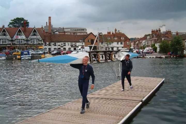 Sam Hogsbjerg and Aidan Dunn carrying their pair at Henley in 2002.