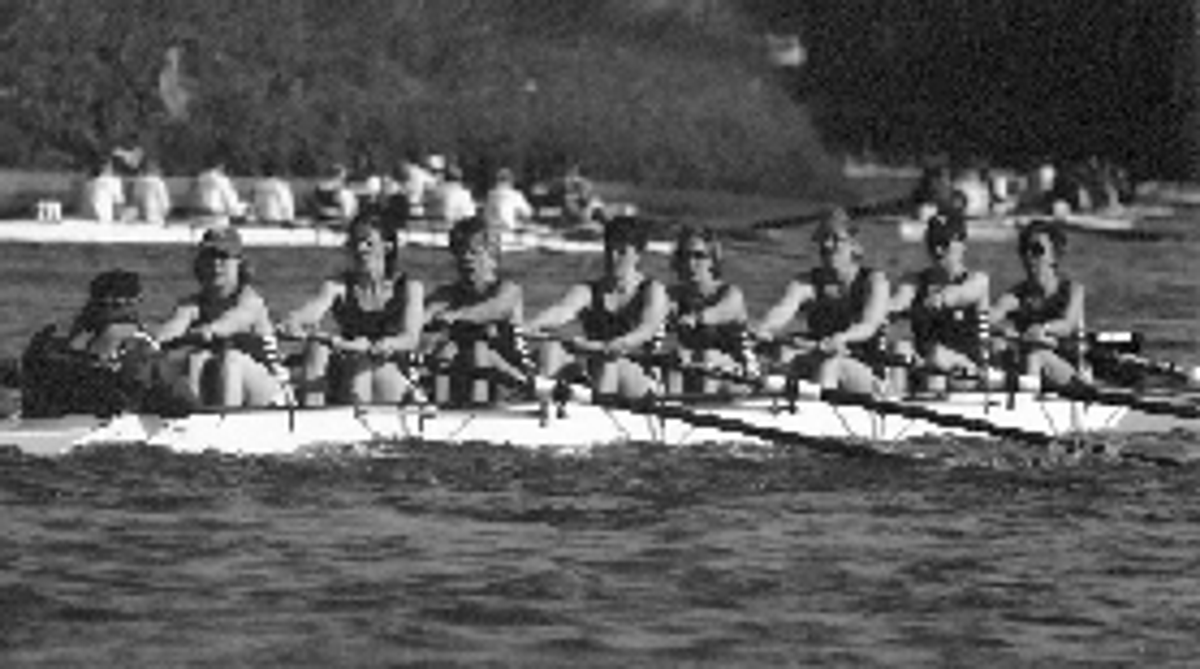 A black and white photo of the women’s eight.