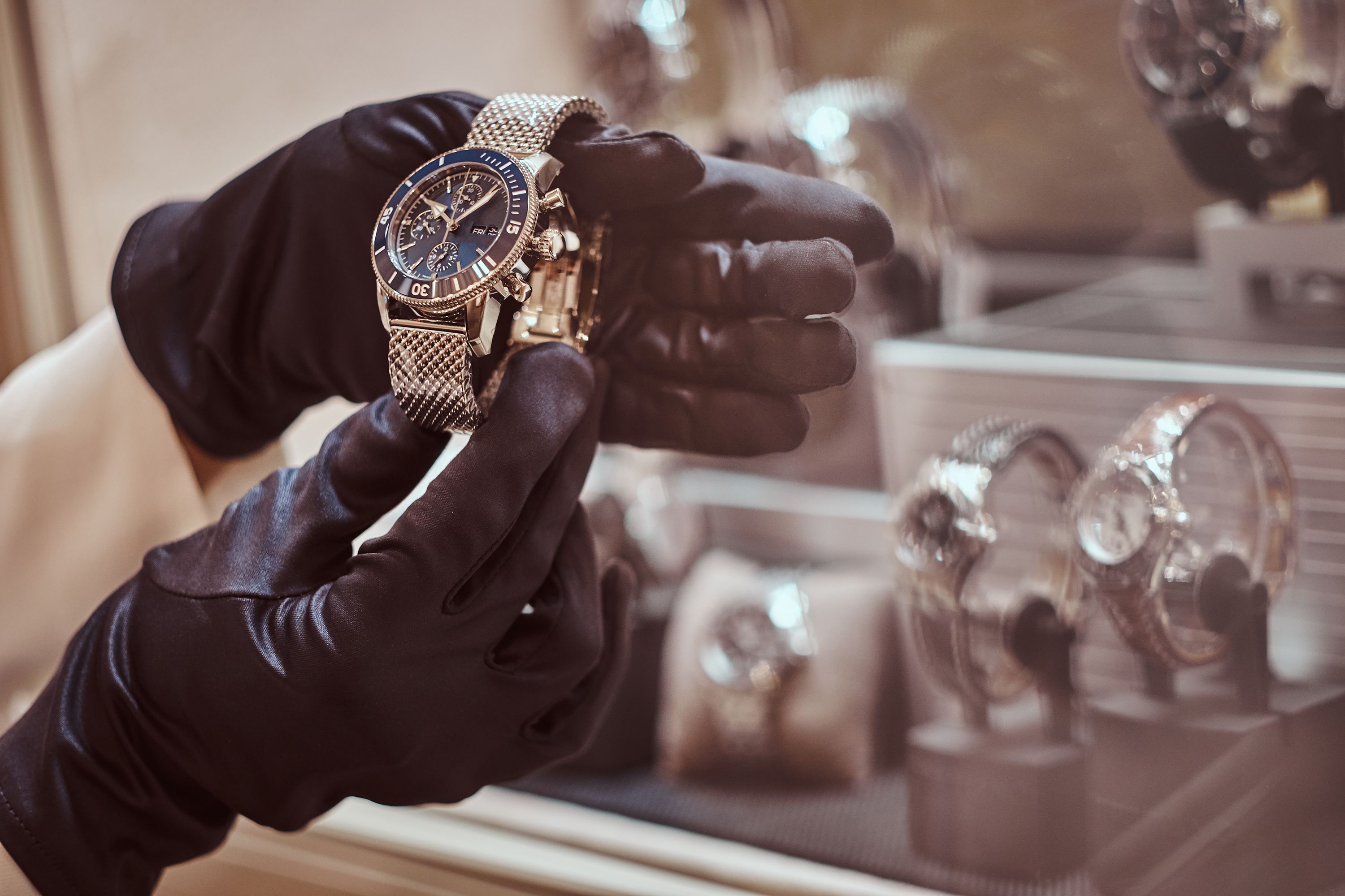 Luxury Watch Dealer with Gloves