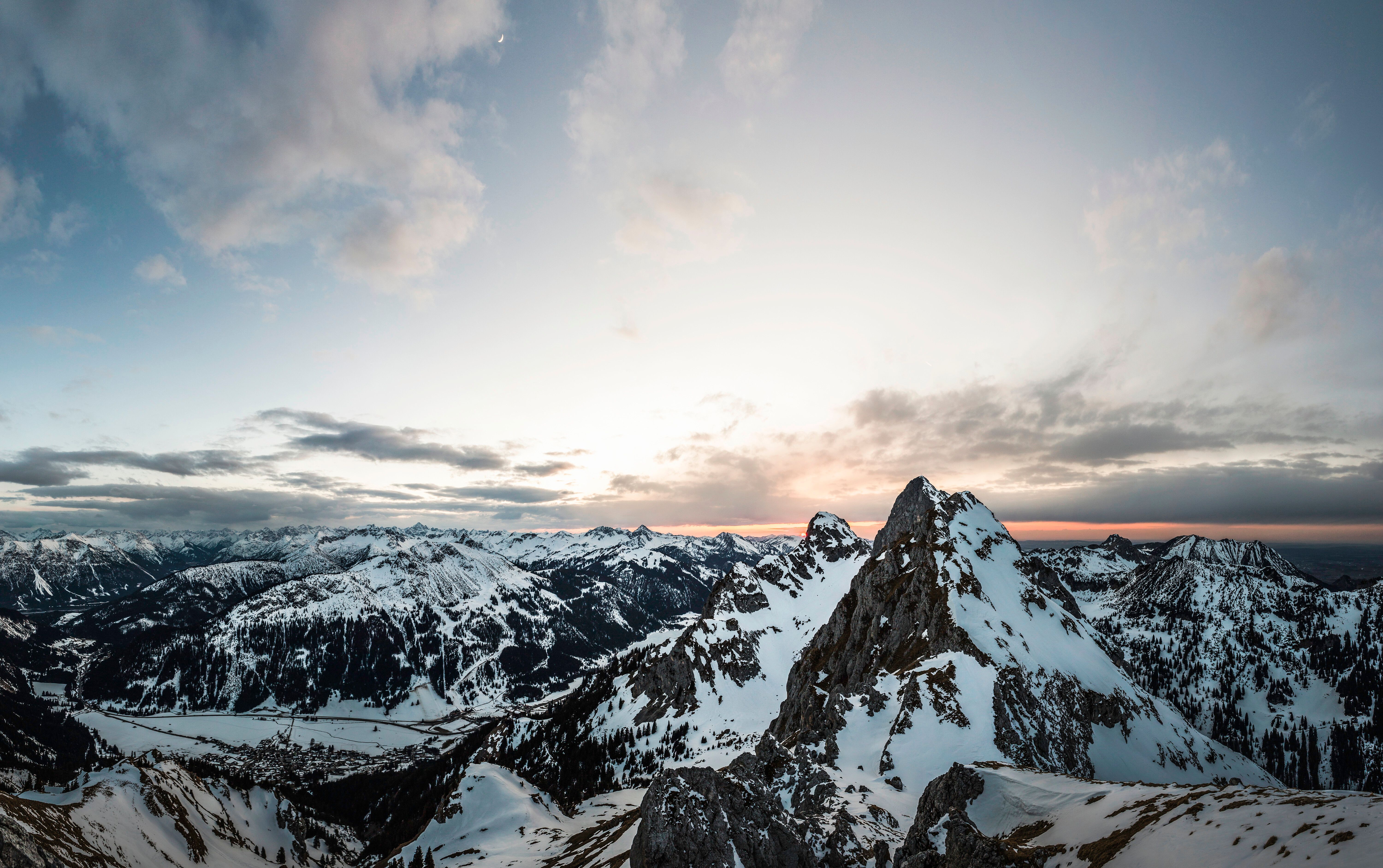 Majestic mountain peaks bathed in the warm glow of sunset