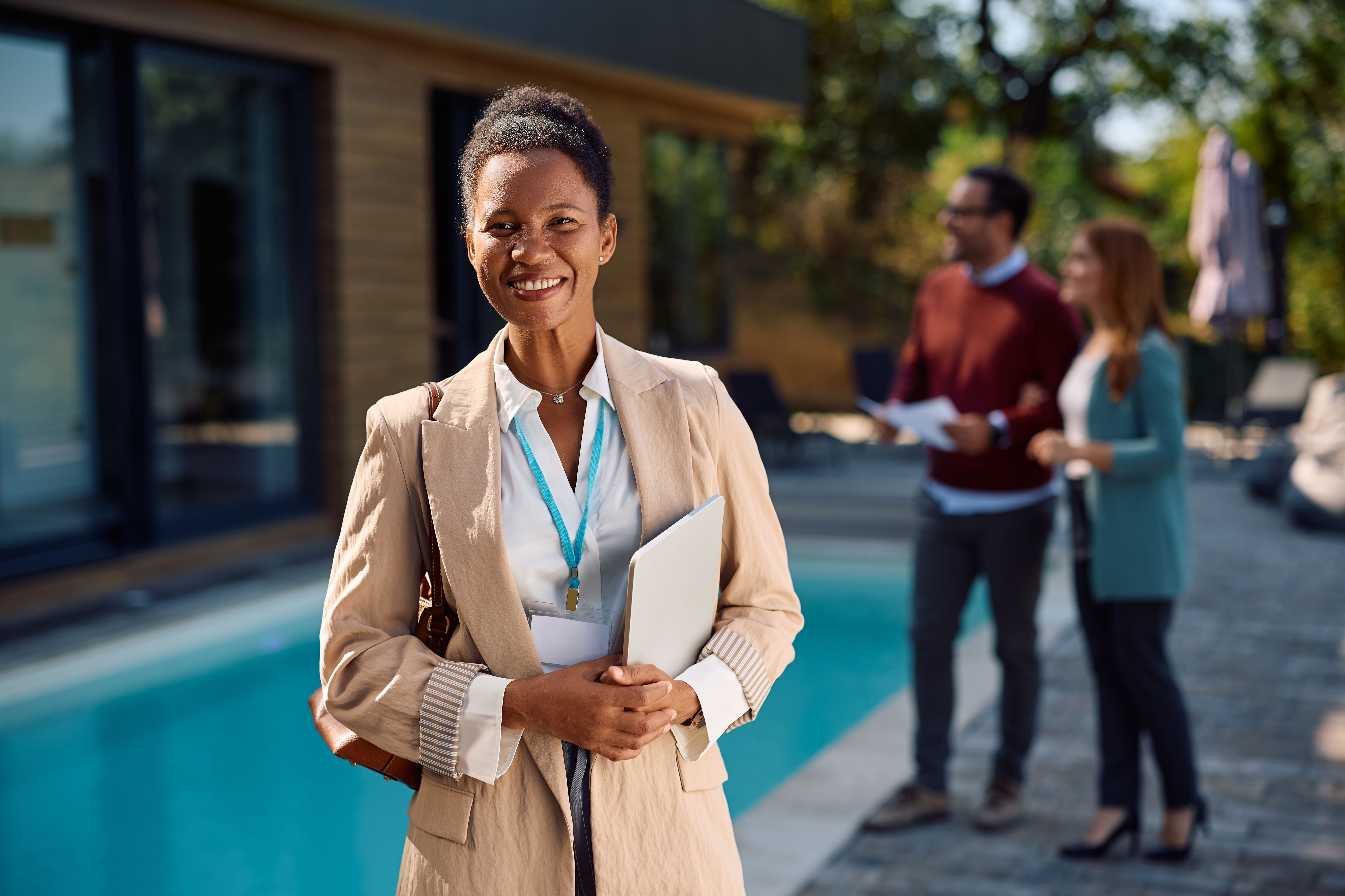 Real estate agent reviewing digital marketing analytics and lead generation systems.