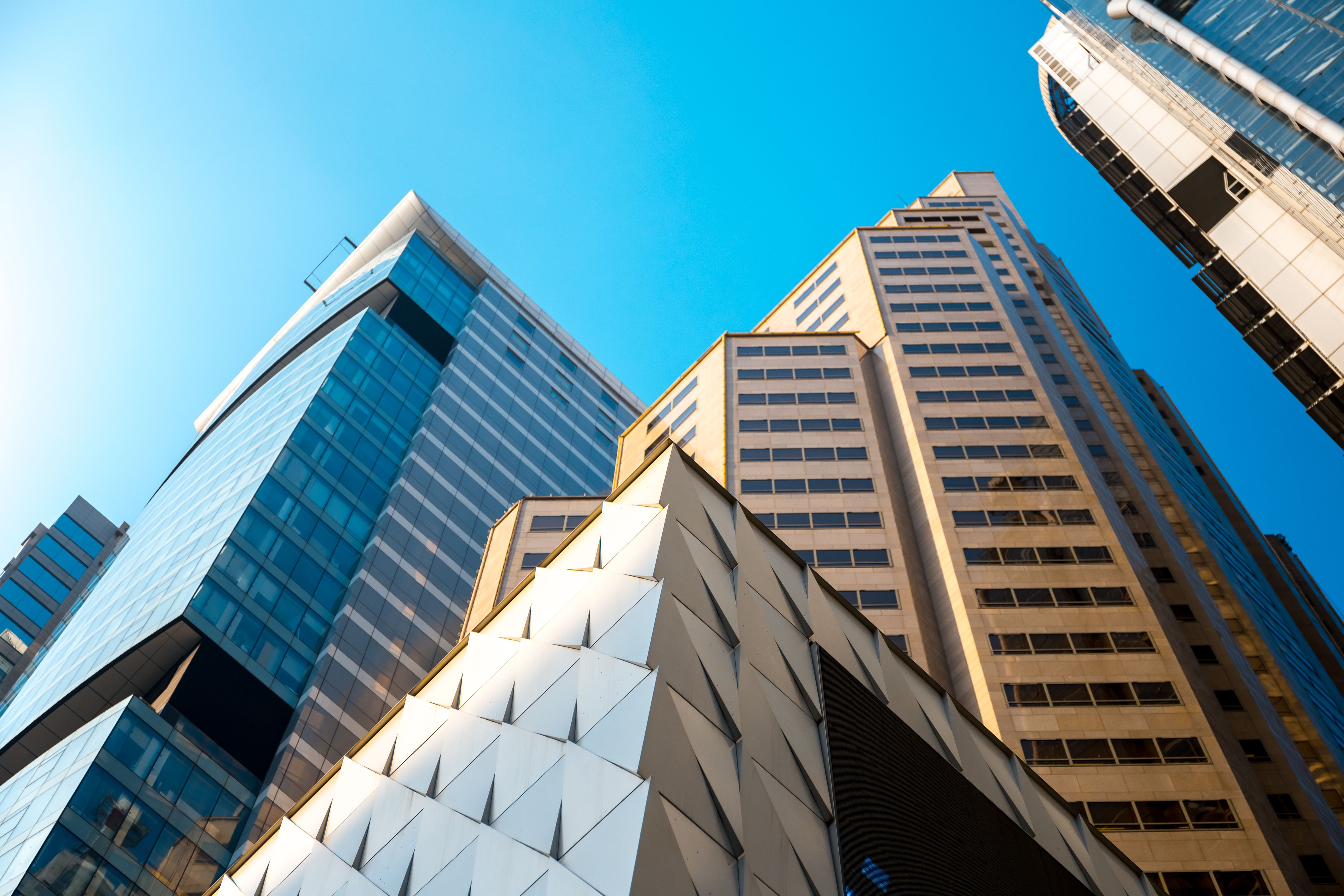 Bottom Up View Of Modern Office Building In Hong Kong