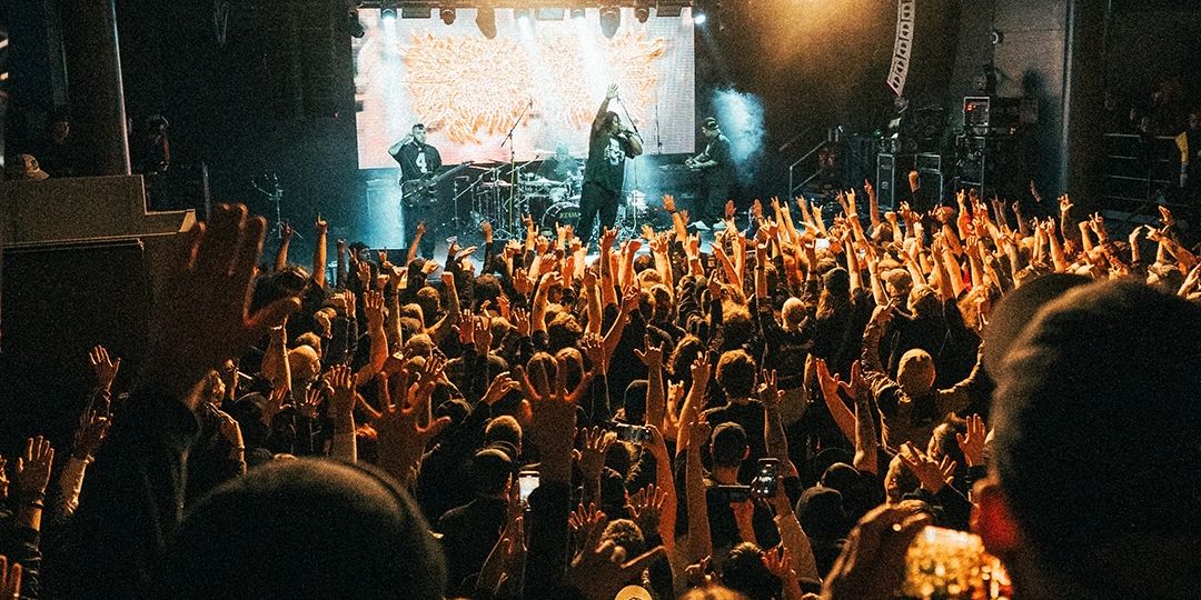 PeelingFlesh performing live on stage, photo by hrdmnxvisuals
