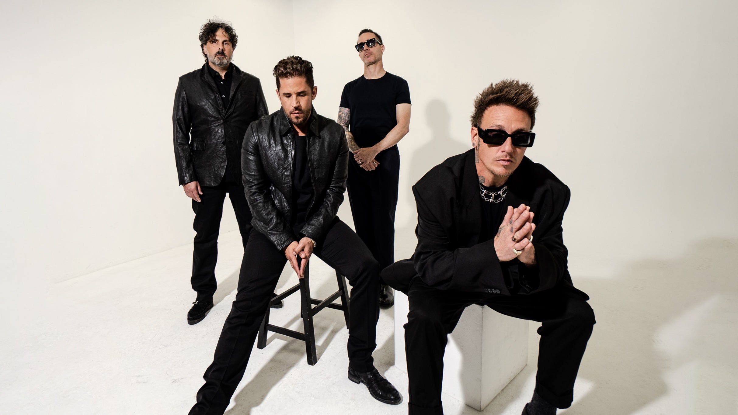 Papa Roach performing live on stage, headlining ShipRocked 2027 cruise lineup announcement