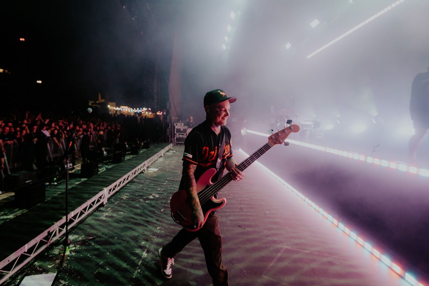 Ahren Stringer performs on stage with dramatic lighting, showing his continued musical journey and artistic renaissance