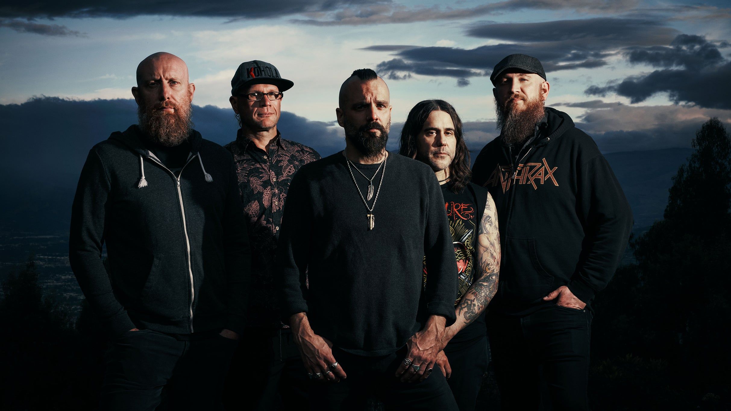Killswitch Engage performing live on stage with dramatic lighting