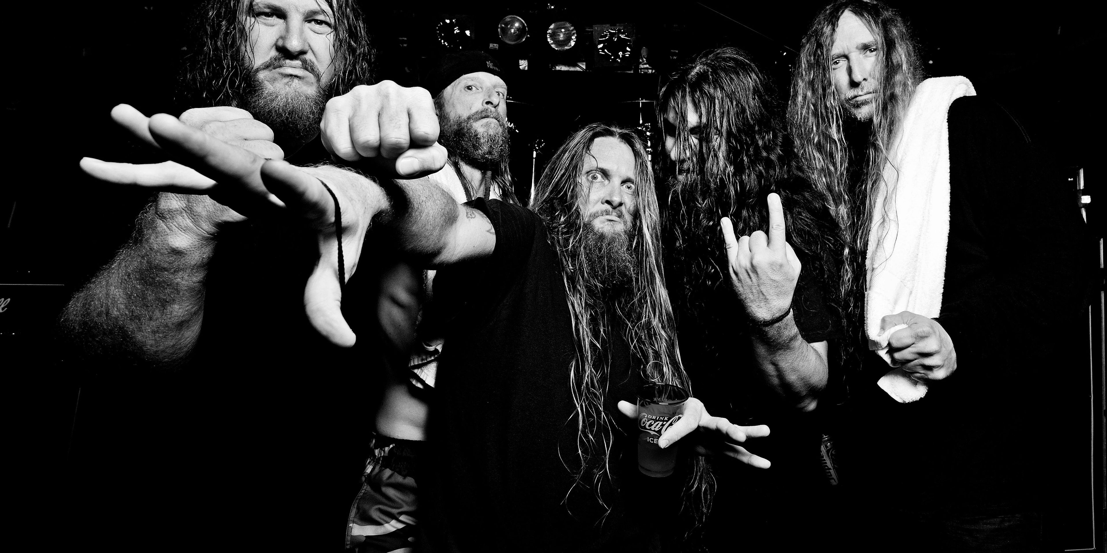 Obituary performing live on stage, death metal band from Tampa Florida