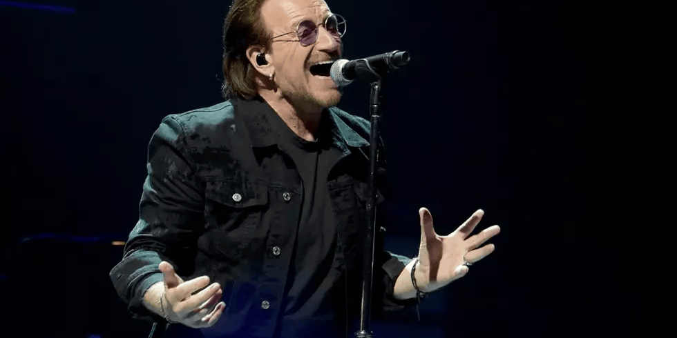 U2 performing live on stage